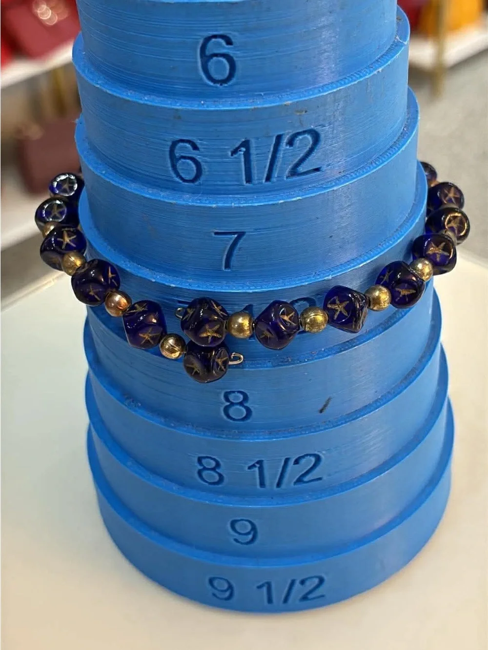Handcrafted Blue Glass Bead Bracelet with Gold Accents